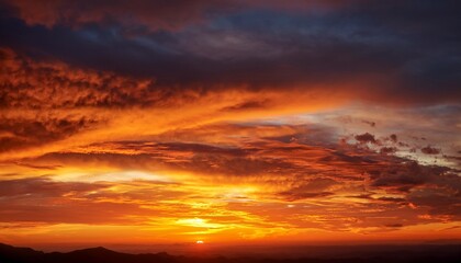 Fototapeta premium Vivid Atmospheric Golden And Orange Colors Fill The Sky During Dawn Perfect Natural Background Image Displaying Morning Light Illuminated Dramatic Wallpaper
