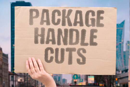 "Package handle cuts" Carrying a box becomes painful when the edge digs in. BOX. CARRY. HANDLE. PAIN. DELIVERY.
