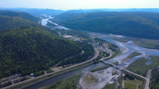 Drone footage reveals Matapedia village and surrounding transportation infrastructure at the spectacular meeting point of the Matapedia and Restigouche rivers.