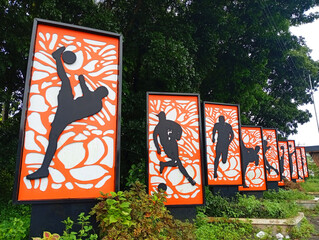 Outdoor series of sports silhouettes art displays on orange backgrounds with silhouettes displays athletes exercise © difre