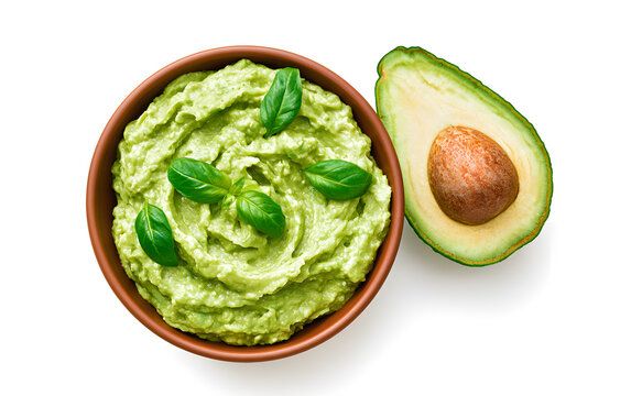 Bowl with guacamole and ripe avocado on white background, top view