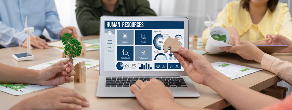 Human resources management software on computer screen helping human resources employee to manage recruitment, payroll, staff searching and KPI evaluation brisk