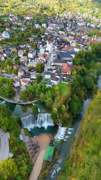 Aerial drone flying over pliva waterfall in jajce bosnia