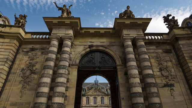 Palais Rohan main gate archway showing baroque architecture, sculptures, and detailed stone facade