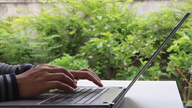 Cybersecurity, Cyber security 2FA login concept. Man hand using two step authentication and verification online account login with laptop, smartphone. Remote work, freelancing, banking and shopping.