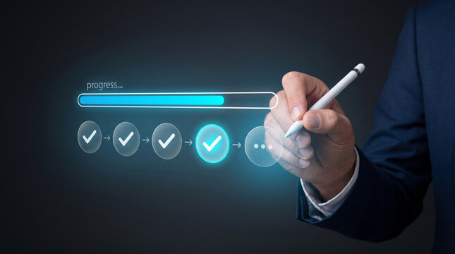 Businessman pointing stylus pen on digital loading progress bar with checkmark step icons for project management business workflow efficiency and task achievement concept