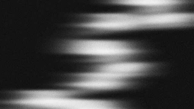 Abstract cinematic monochrome background texture with grainy motion blur light leaks.
