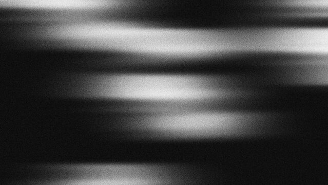 Abstract cinematic monochrome background texture with grainy motion blur light leaks.