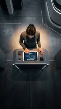 Modern Woman Interacting With Futuristic Self Service Kiosk Technology
