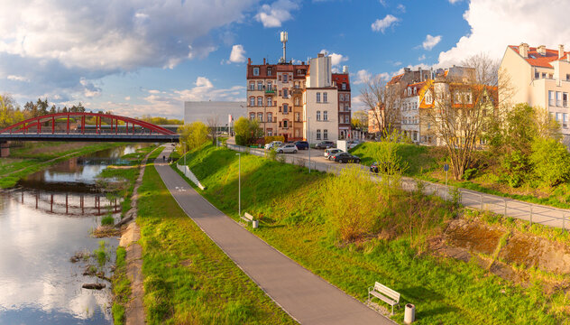 Historic residential buildings of Srodka district along the Warta River in Poznan, Poland.