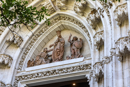 The tympanum of the portal is decorated with statues of the Virgin Mary in a crown, St. John the Evangelist and Archangel Michael defeating the dragon