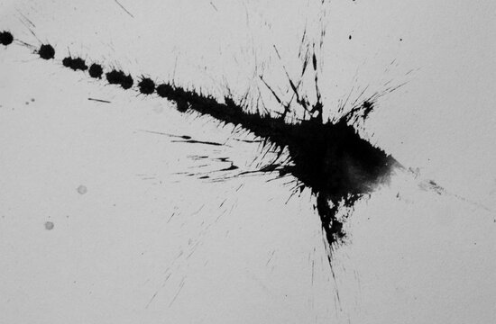 Abstract black ink splatter with a bold textured stroke, scattered droplets, fine spray marks, and expressive brush details. A dynamic hand drawn ink effect suitable for posters, comics, branding.