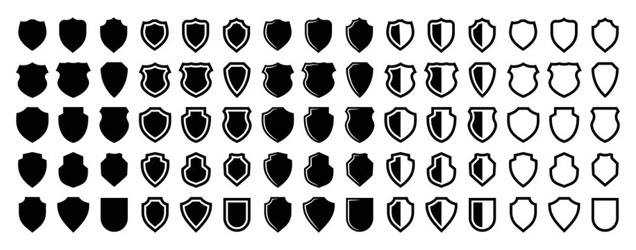 Diverse vector collection of black and white shield icons, ideal for security and protection themes.