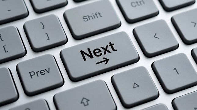 Close up of next button on computer keyboard