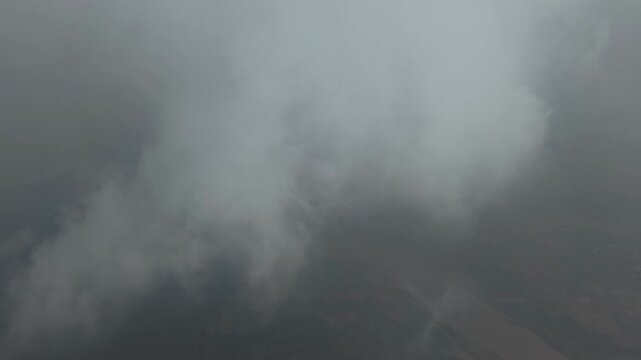 Dramatic Aerial View of Ominous Storm Clouds Overcast Sky Flying Above Weather Horizon
