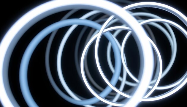The image features a series of illuminated, glowing rings arranged in a seemingly random pattern against a dark background