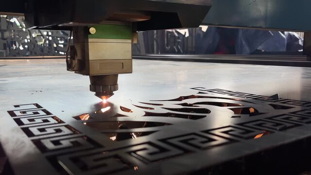 Industrial Laser Cutting Machine Cutting a Metal Sheet with Precision