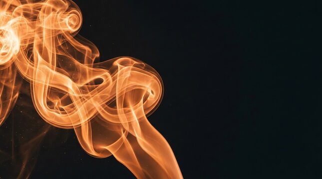 Abstract orange smoke flowing from left across a dark black background creating an elegant ethereal and dynamic visual effect.