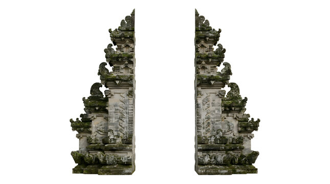 Intricate traditional Balinese Candi Bentar split gateway with stone carvings, Indonesian heritage