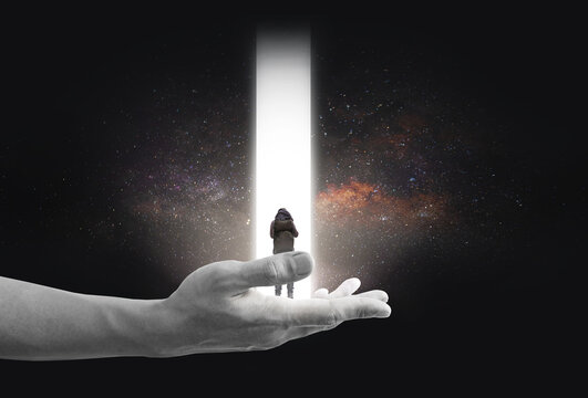 Digital collage art, human on hand with bright gate, on stars background. Imagination, limitless opportunity, success, ideas, creativity and technology concepts