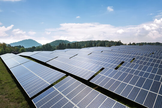 Large Scale Solar Power Farm Under Clear Blue Sky