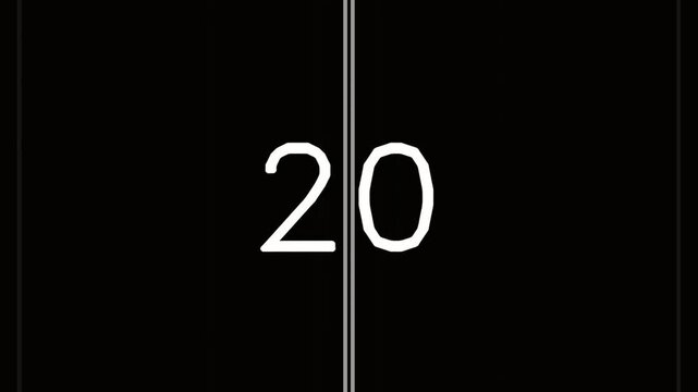 Retro Flip Clock Displaying Number Twenty on Black Background