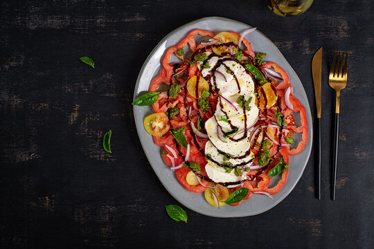 Caprese Salad with Mozzarella, Tomatoes and Balsamic Glaze. Top view