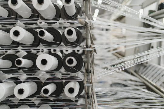 Polypropylene yarn winding on spools in textile factory