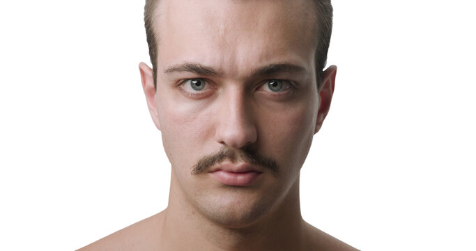 Frontal Studio Portrait of Young Man with Mustache and Intense Expression