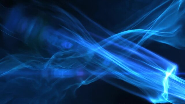 Abstract glowing blue light waves crossing on dark background with futuristic energy flow effect