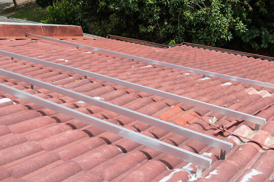 Mounting structure installed on residential roof, ready to mount solar photovoltaic or PV panels onto in Malaysia