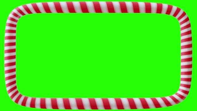 Candy cane border frame with moving red and white stripes on green screen background for holiday video projects.
