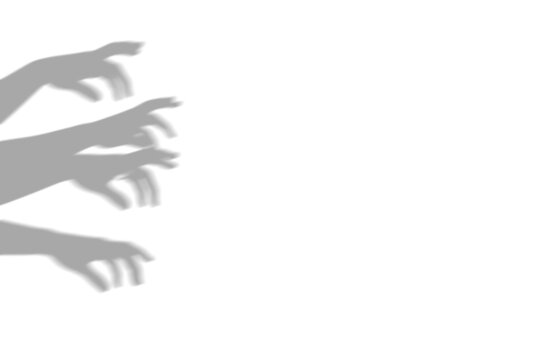 Creepy shadow of multiple hands reaching out from the left side of the frame representing fear and horror isolated on transparent background