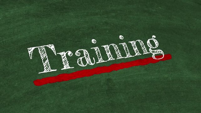 The Word Training Handwritten in White Chalk with Bold Red Underline on Black Chalkboard Background Symbolizing Skill Development, Corporate Learning, Employee Onboarding, Professional Growth