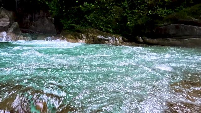 Turquoise Whitewater River in Ecuador Rainforest Canyon, Clear Rapids, Dark Rocks, Green Jungle Banks and Adventure Nature Landscape