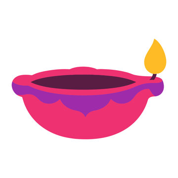 A colorful decorative clay oil lamp diya isolated on white background for the traditional hindu festival of lights diwali