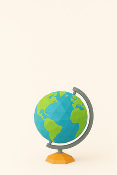 Low poly globe with blue ocean and green continents on yellow stand, isolated on light background with space for text