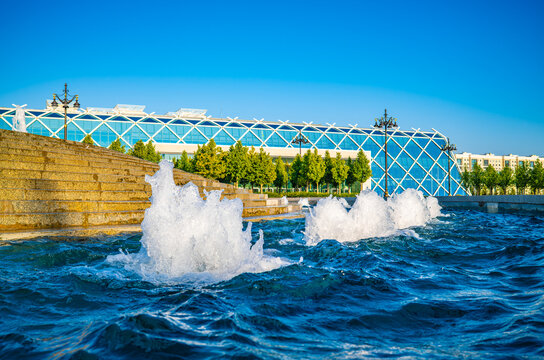 Decorative water fountain spraying jets in Astana Kazakhstan, urban landscape concept