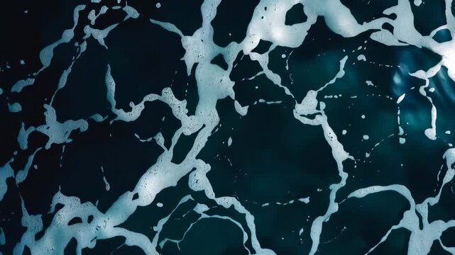 Abstract Ocean Foam Pattern with Dark Water and White Bubbles Texture Wave