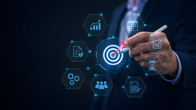 Executive setting business goals and targets with futuristic glowing interface and strategic performance icons.