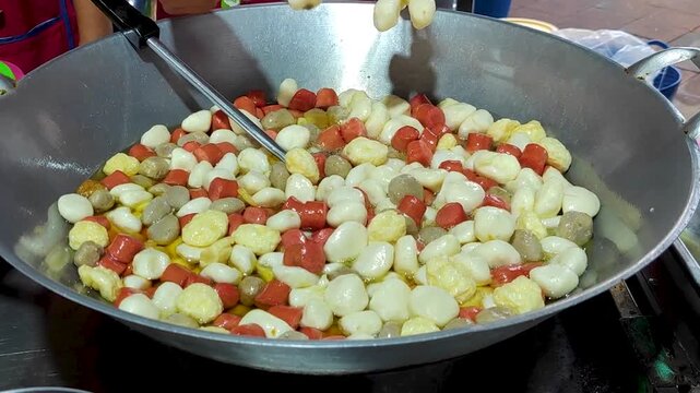 Signature Stand to eat meatball or luck chin yuen kin famous Street food market in buriram train station buriram thailand - City travel and foodie tour 