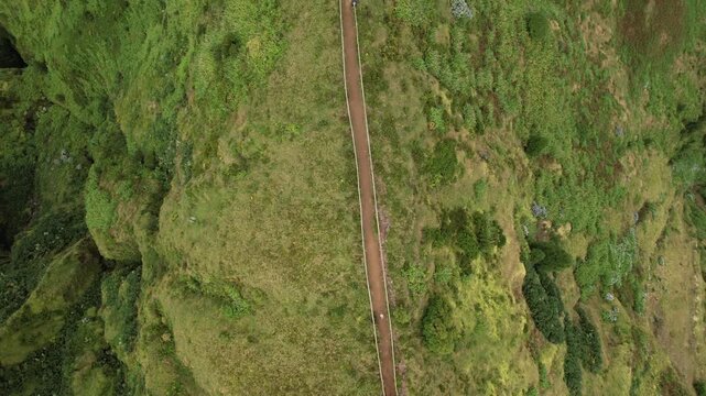 Aerial drone view of Miradouro da Grota do Inferno overlooking the volcanic lakes and lush landscape of Sete Cidades, Sao Miguel, Azores, Portugal