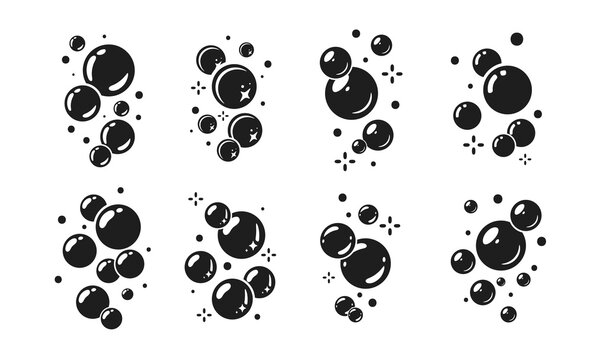 Dynamic collection of abstract monochrome bubbles with sparkling elements for clean product branding