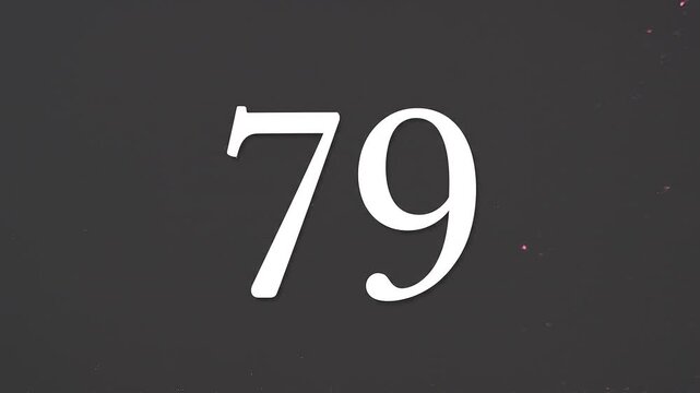Pink Glitter Blows Away and Reveals the Number 79 on Solid Background