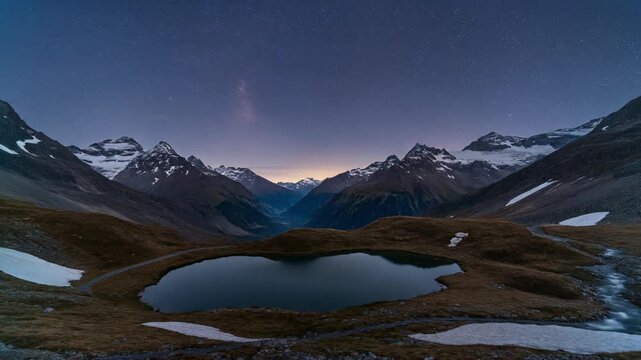 Starry night sky above Lake Champfer Switzerland mountain landscape