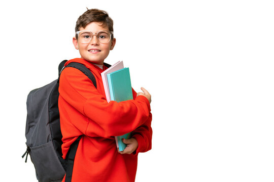 Little caucasian student kid over isolated chroma key background pointing back