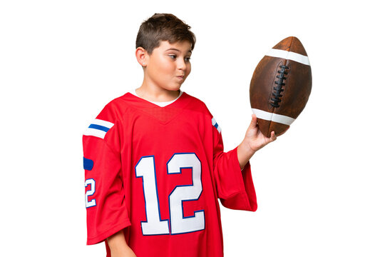 Little caucasian kid playing rugby over isolated chroma key background with sad expression