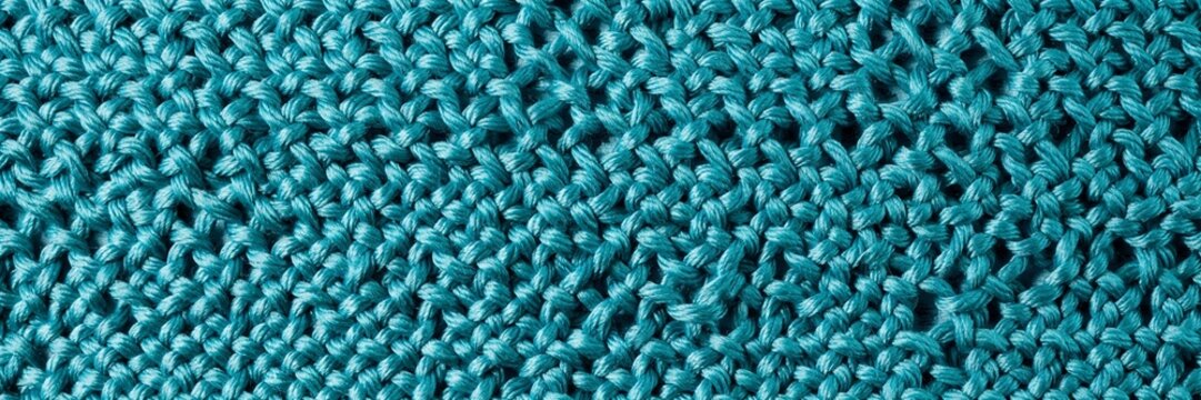 Teal knitted fabric texture background, turquoise wool yarn macro pattern, close up of blue woven textile material, soft winter clothing surface for fashion design and craft projects