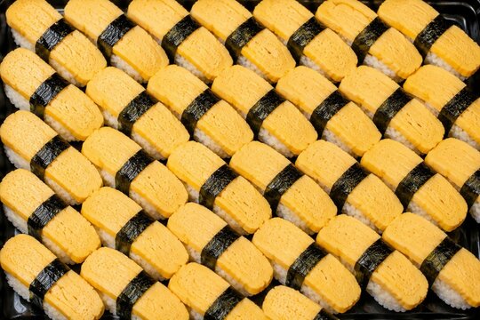Tamago or Egg Sushi Background. Sushi Background.