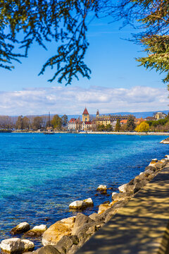 Lake Geneva shoreline with sunny Lausanne view, Switzerland